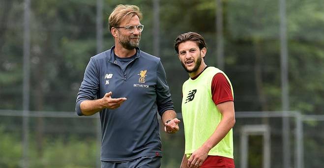 Adam Lallana fait partie de l'équipe de Liverpool pour un affrontement crucial entre la Ligue des Champions et Séville