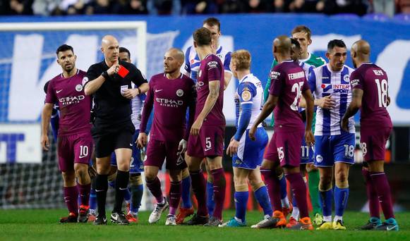 Man City et Wigan ont été inculpés à la suite d'un affrontement contre la FA Cup, mais Sergio Aguero échappe à la punition