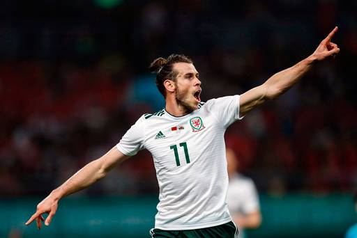 Un début de rêve pour Ryan Giggs alors que Gareth Bale frappe un hat-trick pour battre le record gallois de buteur