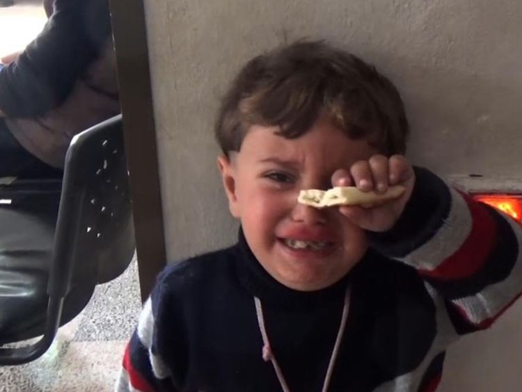  Un enfant pleure dans un hôpital à Afrin, en Syrie [19659007] Imag e: </span><br />
        <span class=