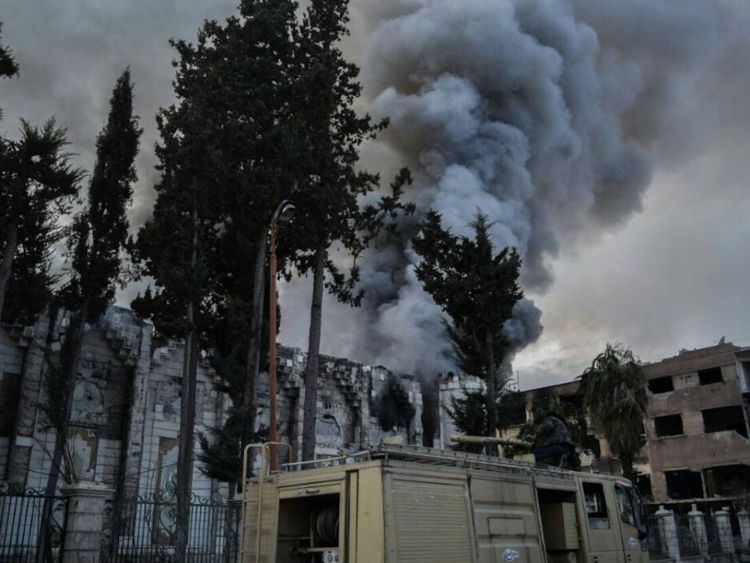  Panache de fumée sur Douma dans la Ghouta orientale, Syrie. Crédit: Save the Children / Secours en Syrie 