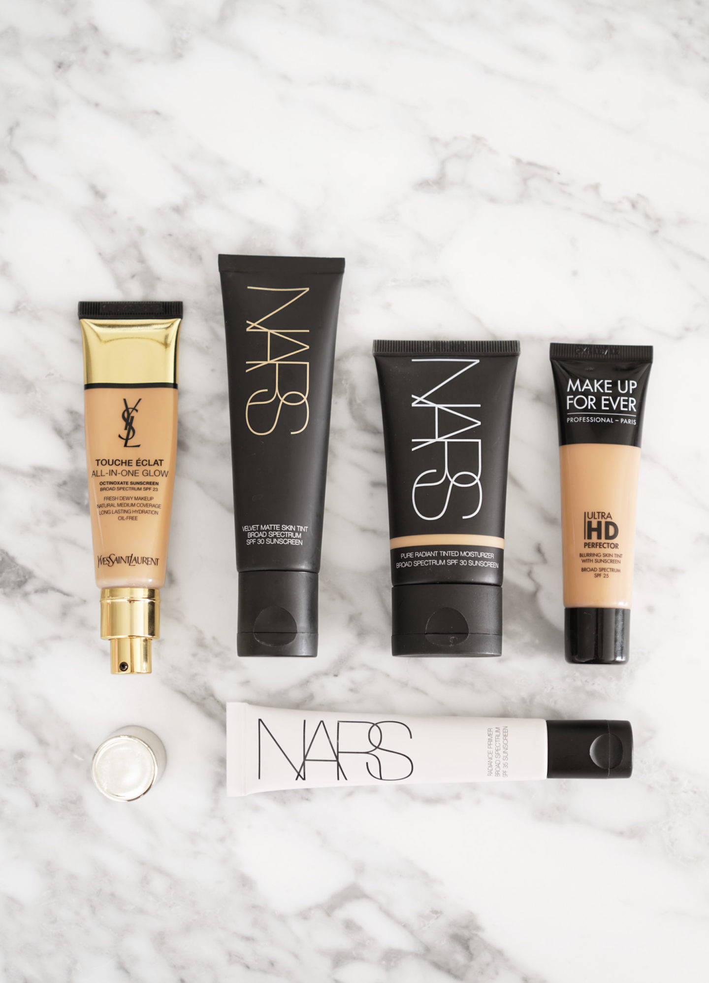  YSL Touche Eclat Tout-en-un Glow, NARS Velvet Matte Teint, NARS Radiant Teinté Hydratant, Make Up For Ever Ultra HD Perfecteur 