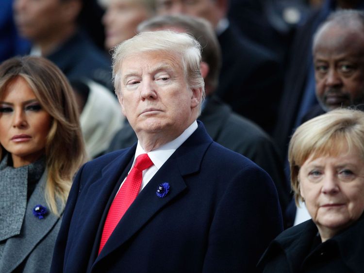Le président Trump avec sa femme et le chancelier allemand à Paris