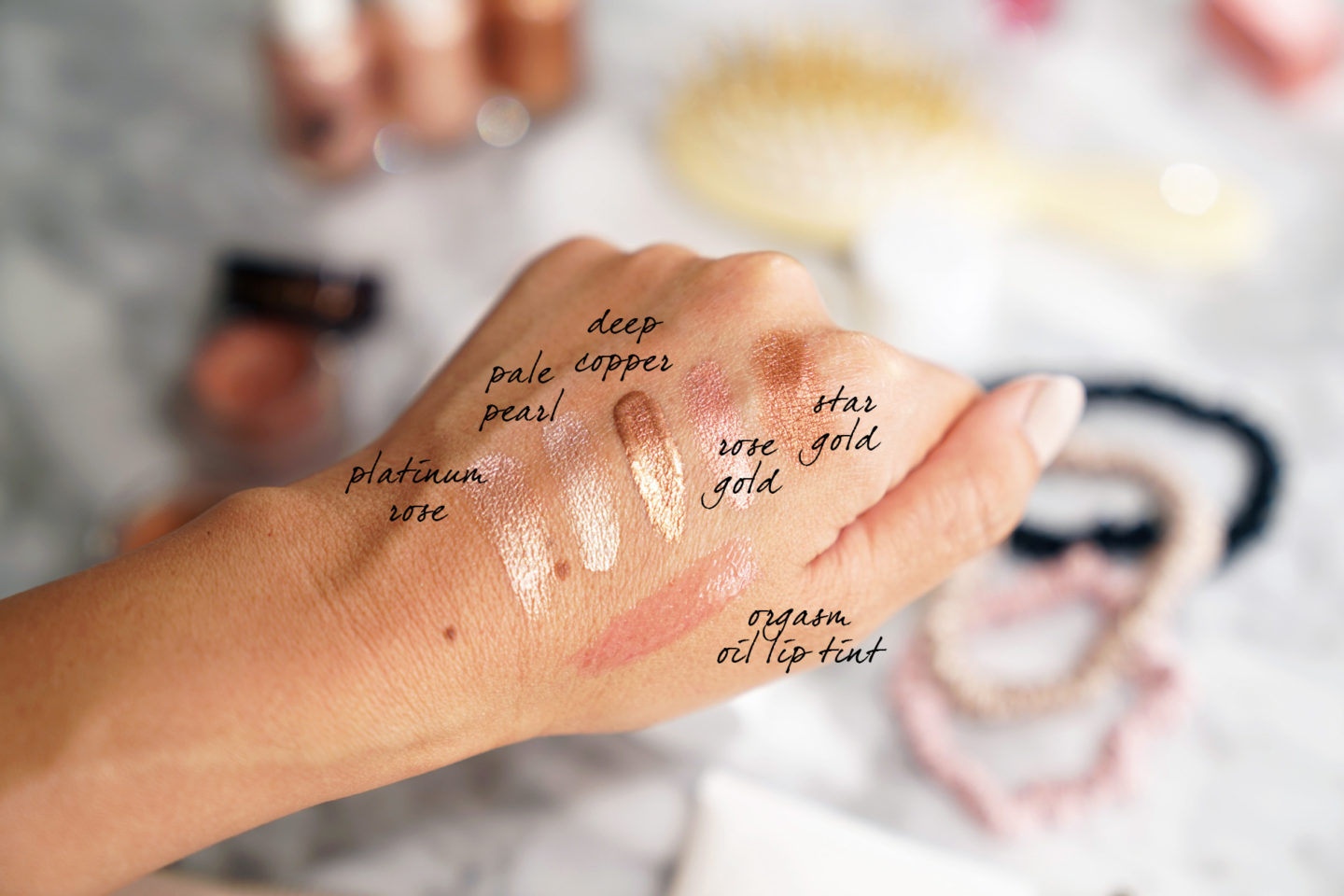 Glossier Play Niteshine, Charlotte Tilbury Rose Gold et Star Gold, NARS Orgasm Teinte