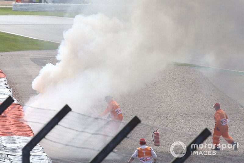 Andrea Dovizioso, vélo Ducati Team en flammes