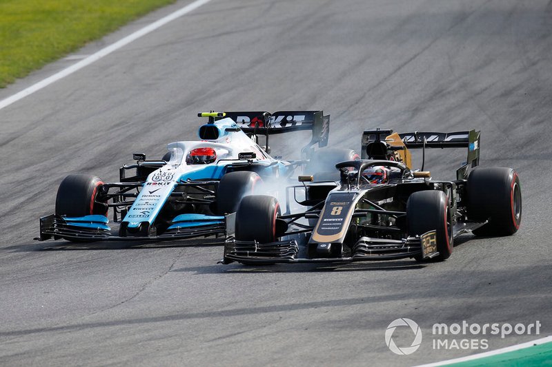 Romain Grosjean, Haas F1 Team VF-19, aux prises avec Robert Kubica et Williams FW42