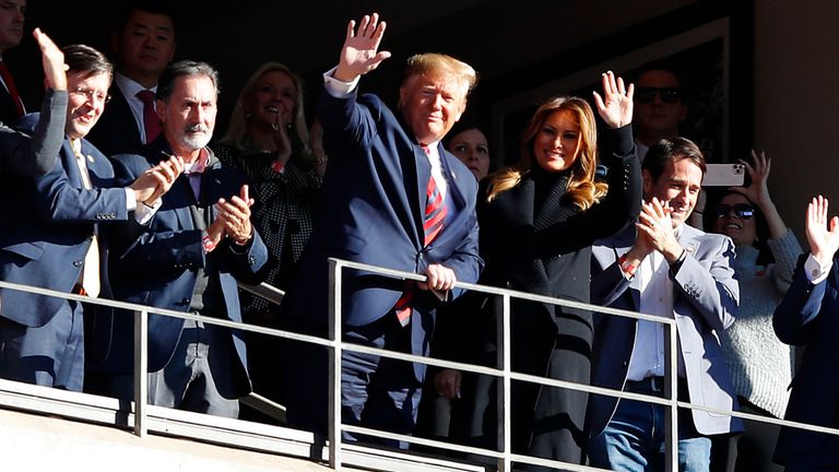 Donald Trump et la première dame où en Alabama assister à un match de football