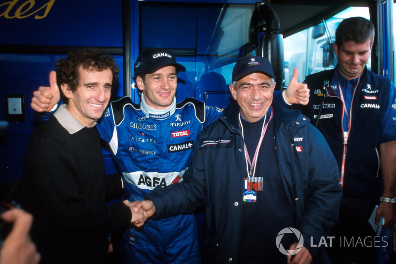 Alain Prost, gauche et Jarno Trulli fêtent leur deuxième place