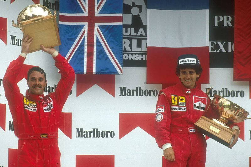 Podium: vainqueur de la course Alain Prost, Ferrari, deuxième place Nigel Mansell, Ferrari