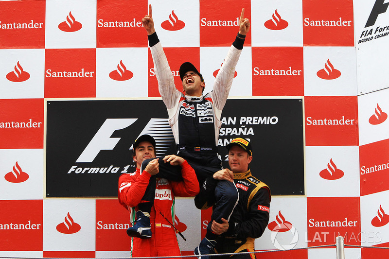 Fernando Alonso et Kimi Raikkonen, vainqueur de l'épreuve de levage, Pastor Maldonado