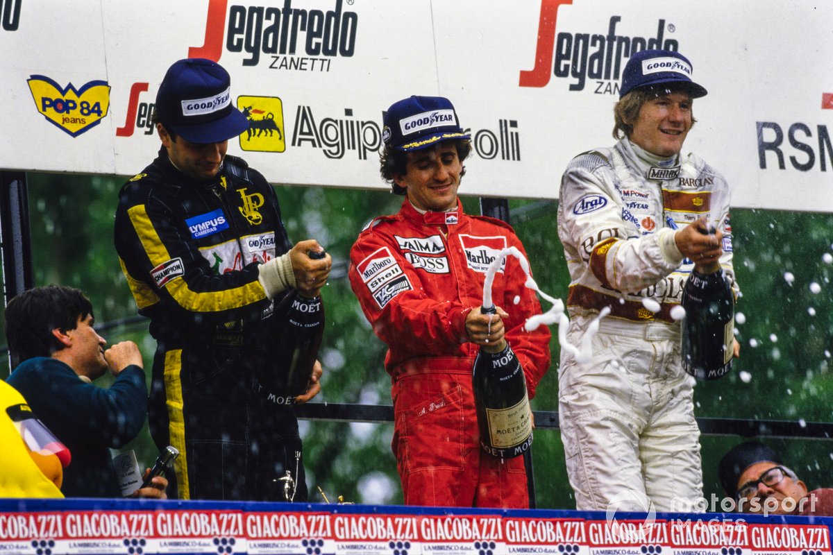 Podium: Elio De Angelis, Lotus, deuxième, vainqueur de la course Alain Prost, McLaren, Thierry Boutsen, troisième, Arrows