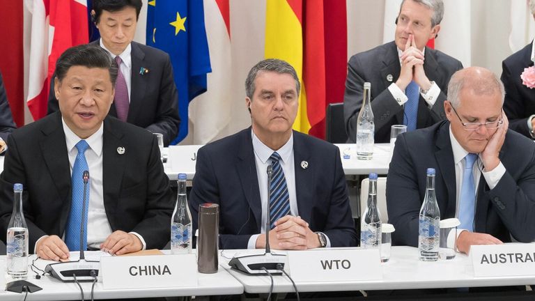 Le président chinois Xi Jinping (à gauche) et le Premier ministre australien Scott Morrison (à droite)