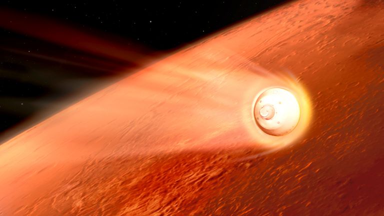 Une illustration d'artiste de l'engin spatial contenant le rover Perseverance ralentissant en utilisant la traînée générée en voyageant dans l'atmosphère martienne.  Pic: NASA / JPL-Caltech via AP