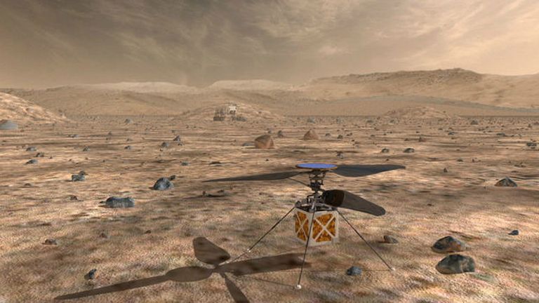 Une vue d'artiste de l'hélicoptère de Mars sur la planète rouge.  Pic: NASA