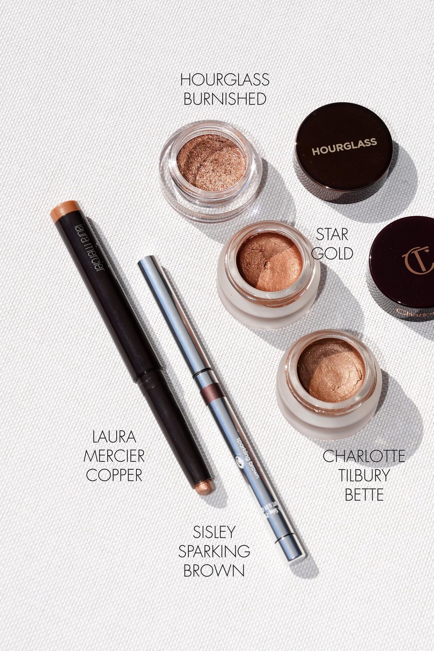 Fards à paupières bronze cuivré Laura Mercier, Hourglass, Charlotte Tilbury
