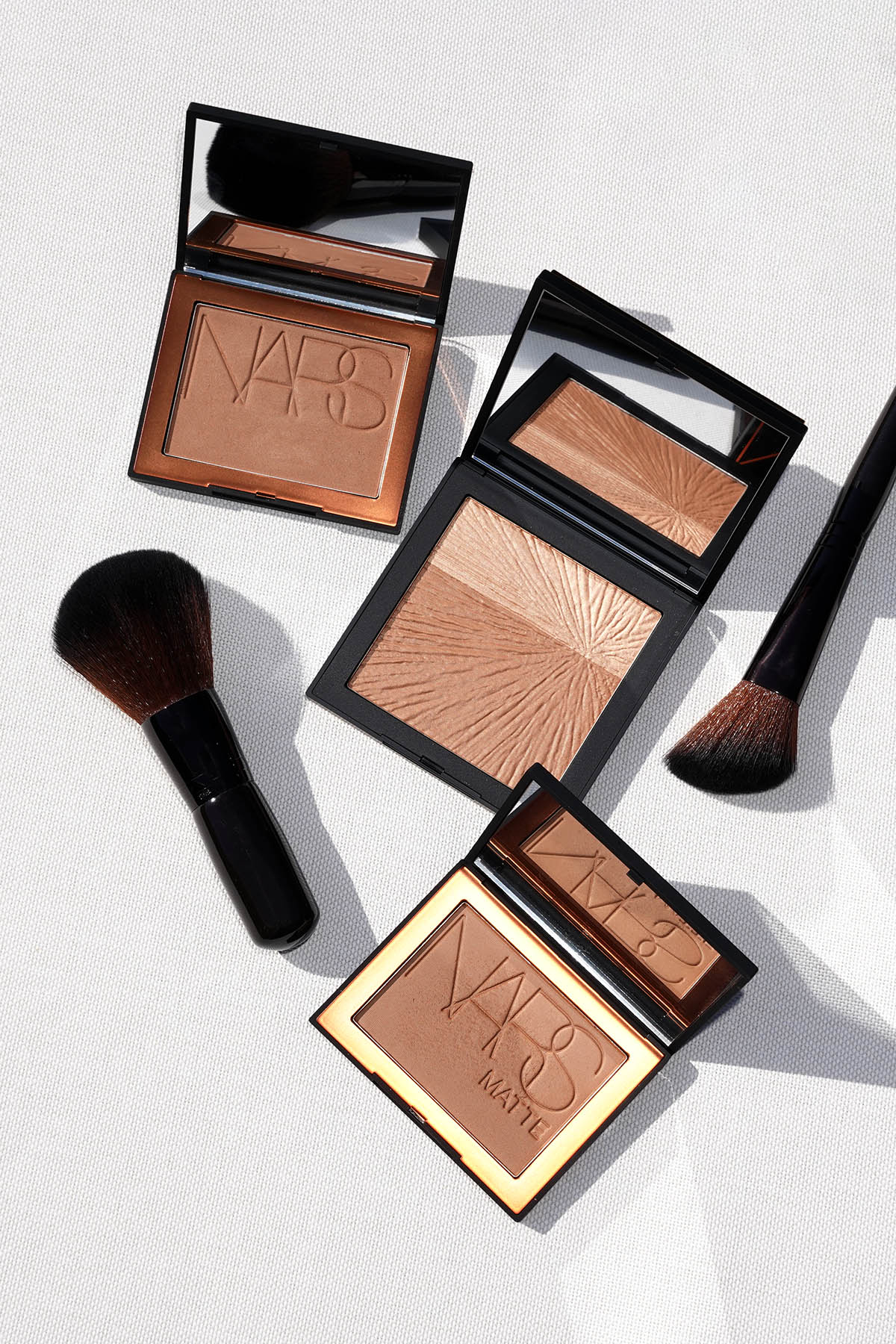 NARS Summer Solstice Bronzing Cheek Duo vs Laguna