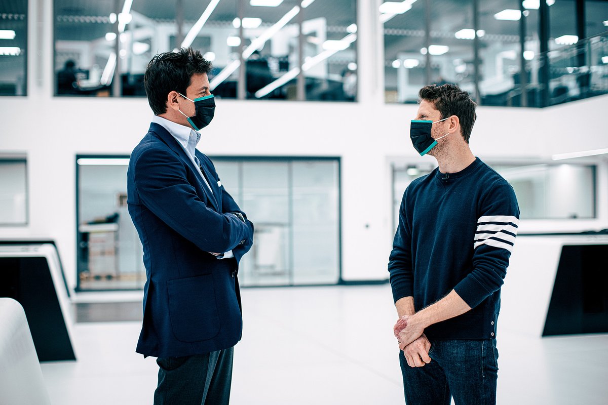 Toto Wolff, directeur exécutif (affaires), Mercedes AMG et Romain Grosjean, Mercedes