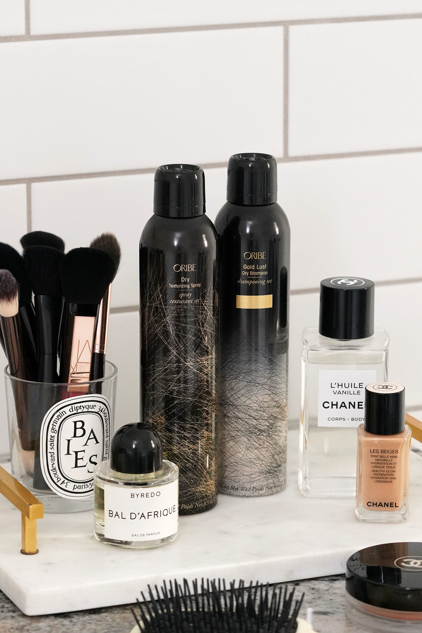 Spray texturisant sec Oribe et shampooing sec Gold Lust